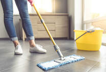 Picture of a woman mopping a floor clean. This picture was taken in Cranberry Township, PA